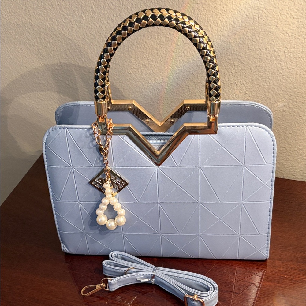 Elegant White Handbag with Gold Accents